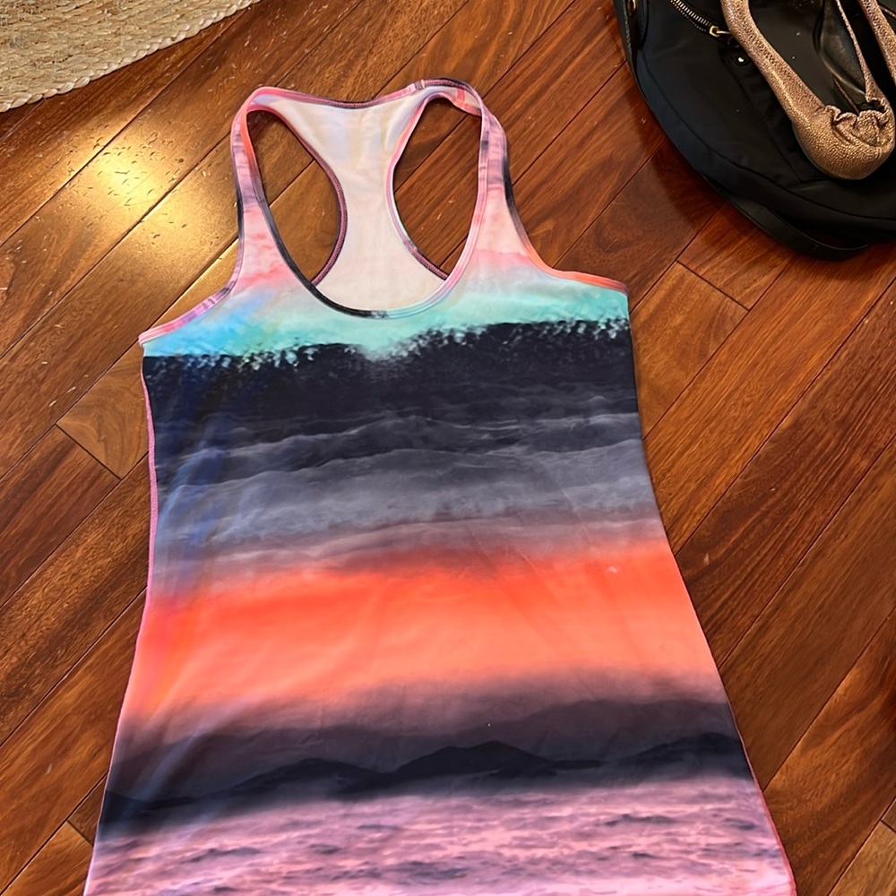 Sunset color lululemon tank. Likely size 12.